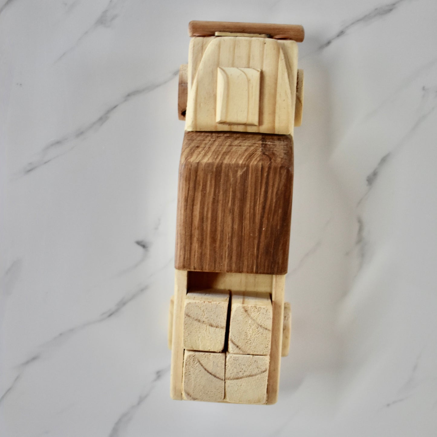 This small handmade wooden land cruiser is the perfect present for any kid (or kid at heart)! You also get some free lusern bales to unload and load on your cruiser. It can be left as is or painted for an extra touch of fun. Makes for an amazing baby shower gift.