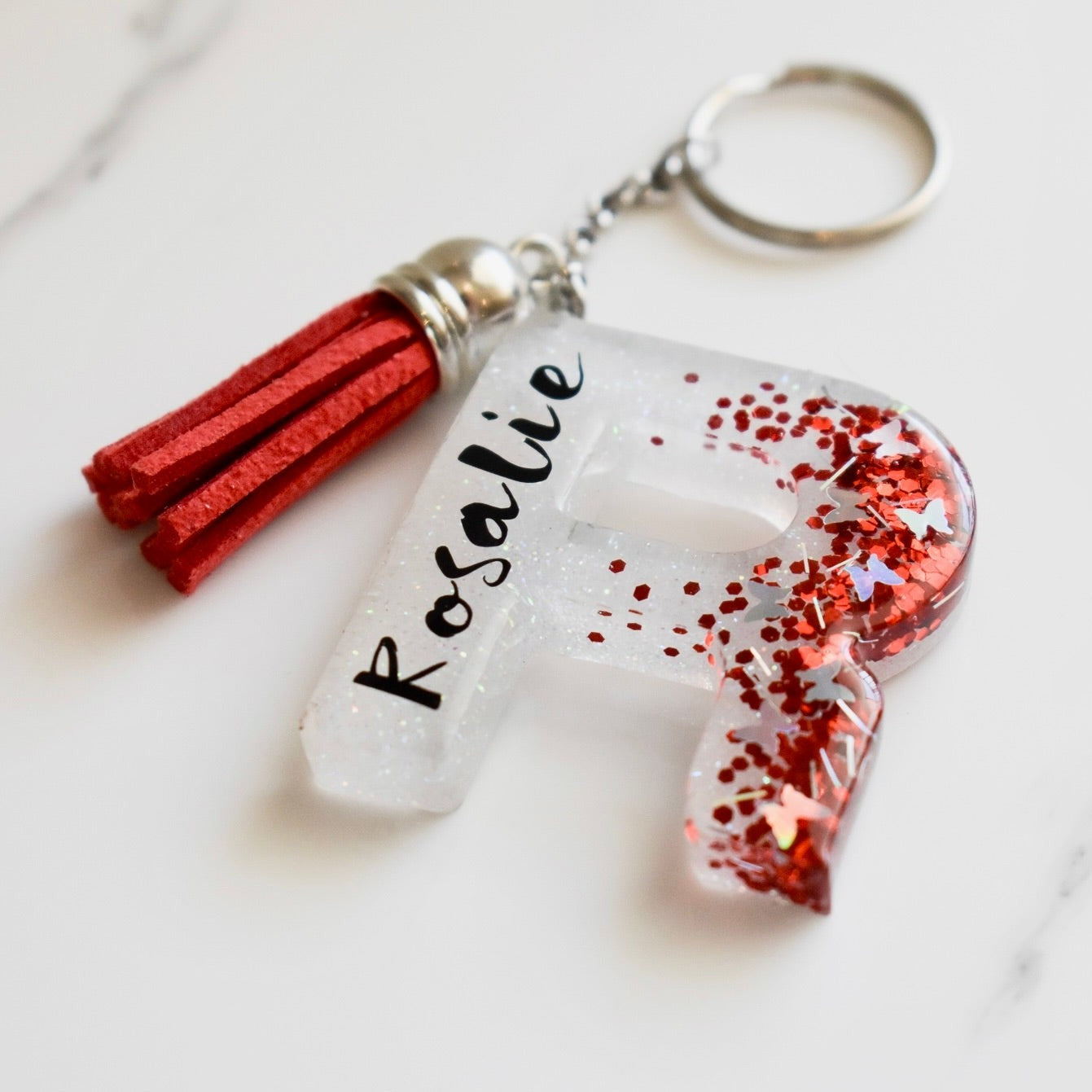 Beautifully hand made resin keychain. A perfect addition to a gift or a great thank you gift for a wedding.