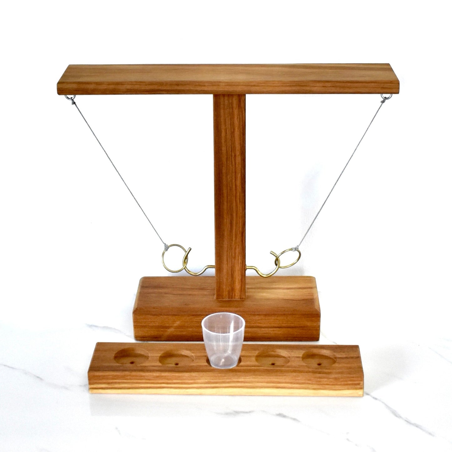 Crafted from sturdy Kiaat wood, this unique drinking game guarantees hours of endless entertainment. It's the ultimate gift for your significant other, dad, or buddy. Impress your braai companions and up your host game with this whimsical and playful addition.