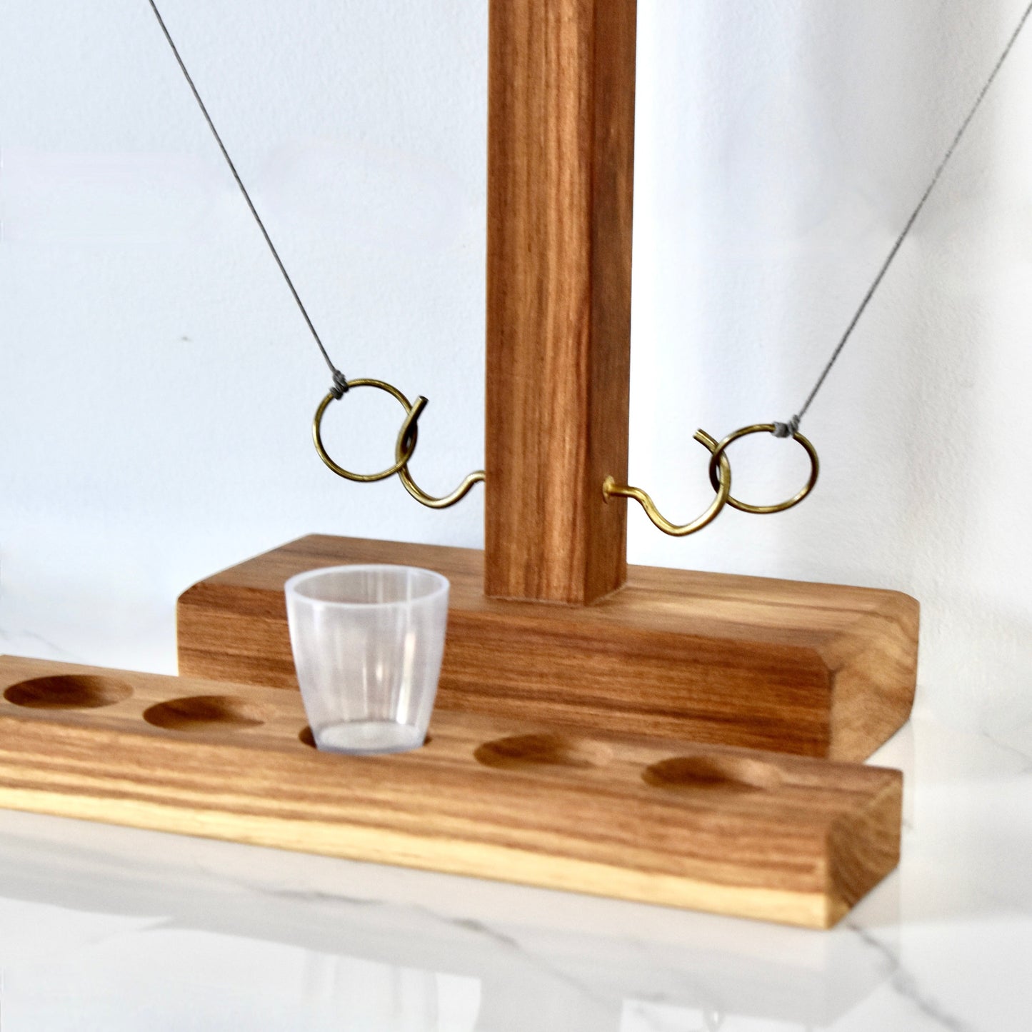 Crafted from sturdy Kiaat wood, this unique drinking game guarantees hours of endless entertainment. It's the ultimate gift for your significant other, dad, or buddy. Impress your braai companions and up your host game with this whimsical and playful addition.