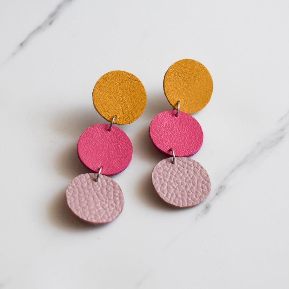 Handmade, light weight and comfortable to wear all day long leather earrings. All our earring hooks are made with a high quality stainless steel and they are hypo allergenic. They will not tarnish or irritate your sensitive skin.