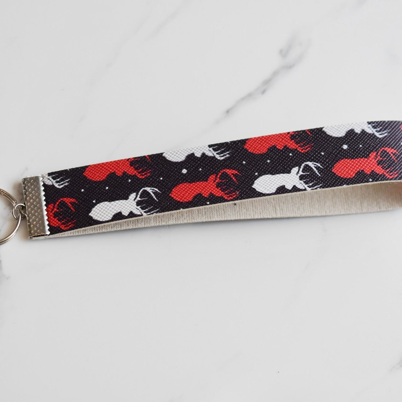 Beautifully hand made faux leather keychain. A perfect addition to a gift or a great thank you gift for a wedding.