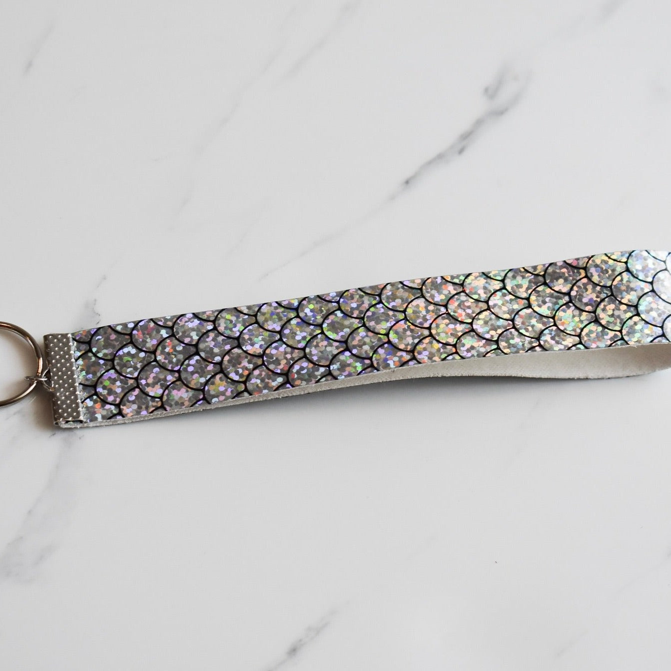 Beautifully hand made faux leather keychain. A perfect addition to a gift or a great thank you gift for a wedding.