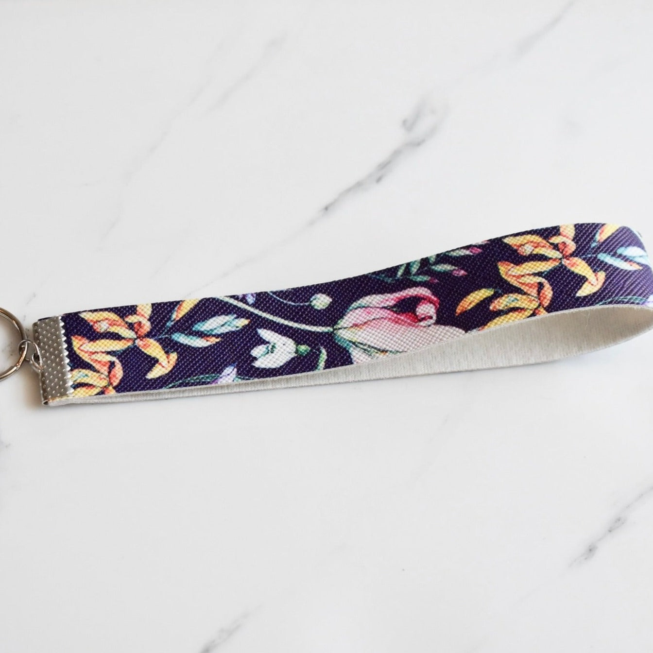 Beautifully hand made faux leather keychain. A perfect addition to a gift or a great thank you gift for a wedding.