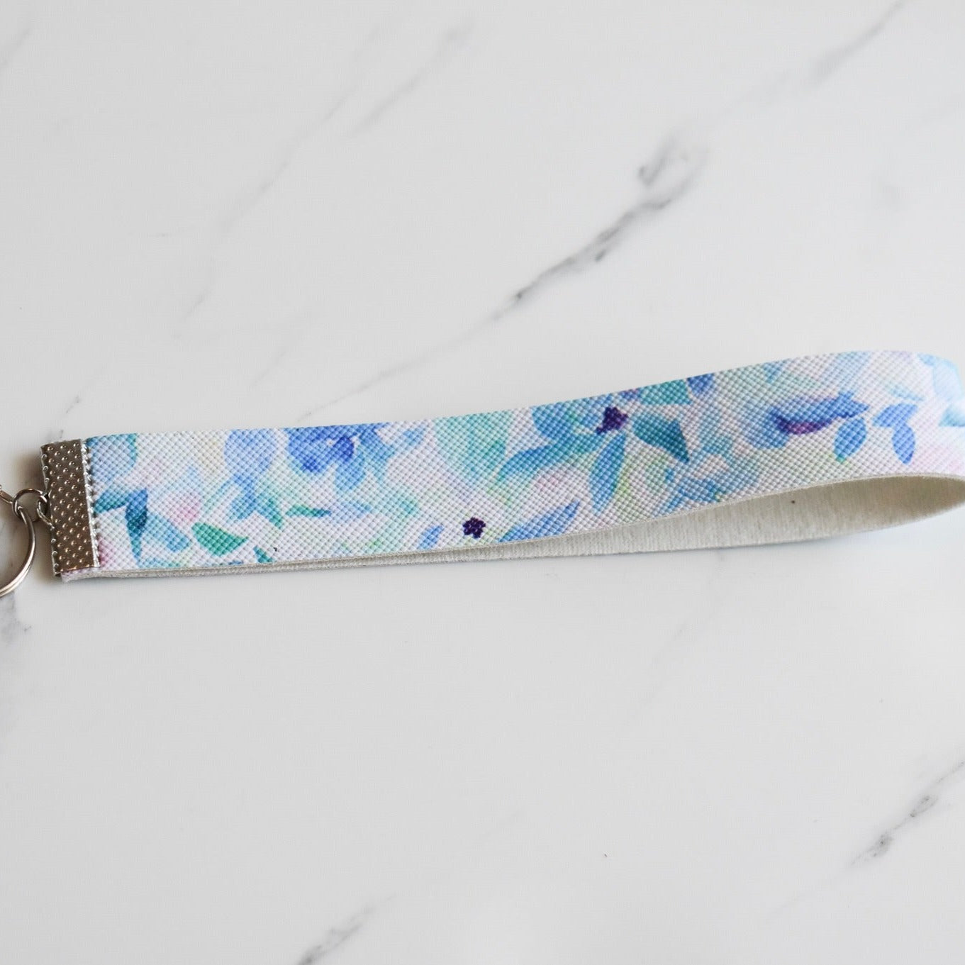 Beautifully hand made faux leather keychain. A perfect addition to a gift or a great thank you gift for a wedding.