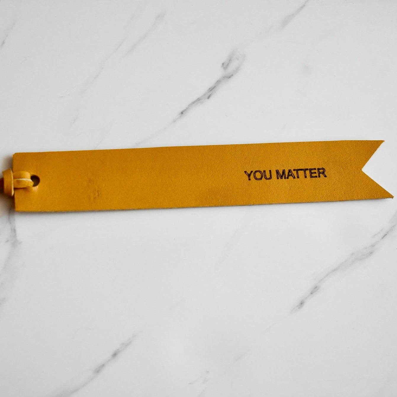 Beautifully hand made genuine leather keychain. A perfect addition to a gift or a great thank you gift for a wedding favour.