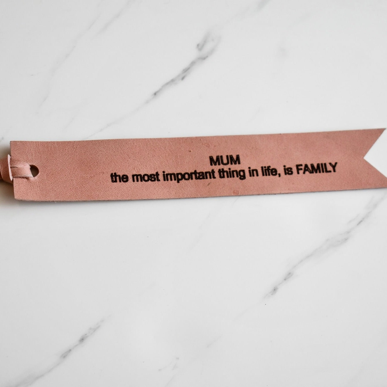 Beautifully hand made genuine leather keychain. A perfect addition to a gift or a great thank you gift for a wedding favour.