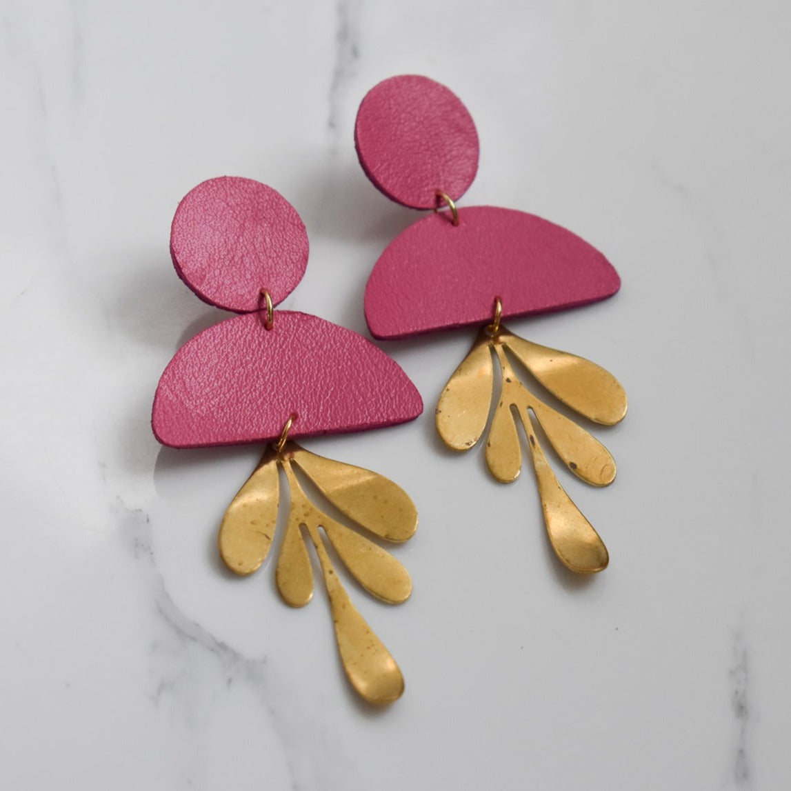 Handmade, light weight and comfortable to wear all day long leather earrings. All our earring hooks are made with a high quality stainless steel and they are hypo allergenic. They will not tarnish or irritate your sensitive skin.