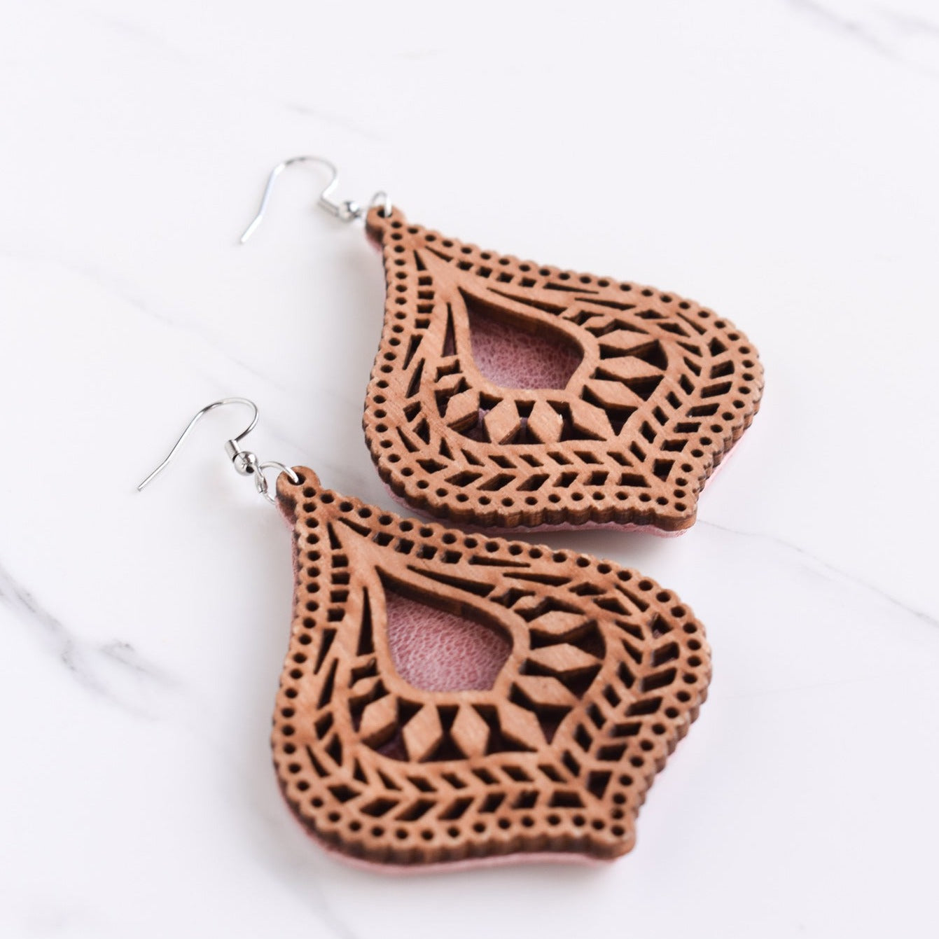 Handmade, light weight and comfortable to wear all day long leather earrings. All our earring hooks are made with a high quality stainless steel and they are hypo allergenic. They will not tarnish or irritate your sensitive skin.