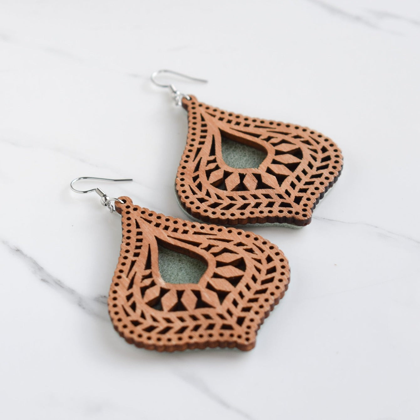 Handmade, light weight and comfortable to wear all day long leather earrings. All our earring hooks are made with a high quality stainless steel and they are hypo allergenic. They will not tarnish or irritate your sensitive skin.