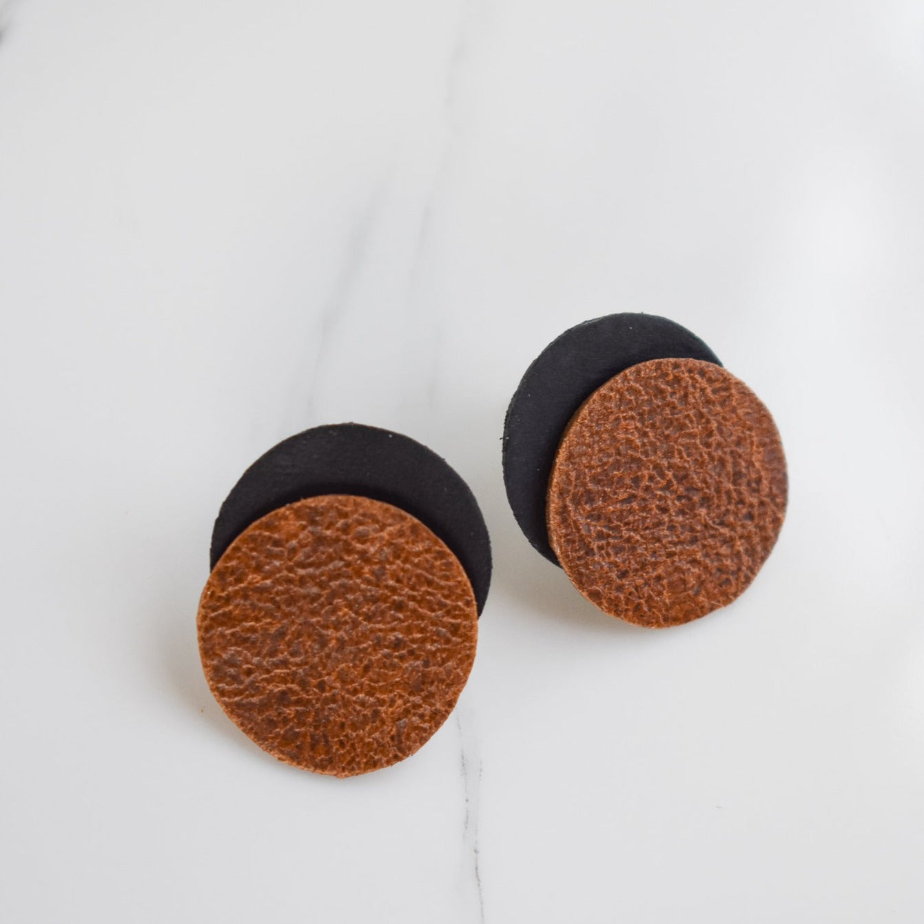 Handmade, light weight and comfortable to wear all day long leather earrings. All our earring hooks are made with a high quality stainless steel and they are hypo allergenic. They will not tarnish or irritate your sensitive skin.