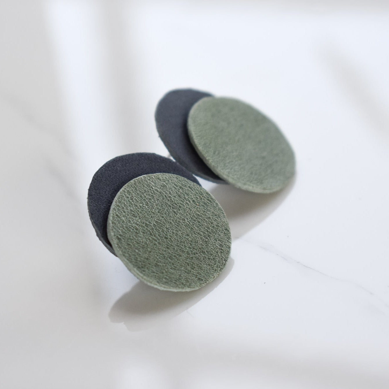 Handmade, light weight and comfortable to wear all day long leather earrings. All our earring hooks are made with a high quality stainless steel and they are hypo allergenic. They will not tarnish or irritate your sensitive skin.