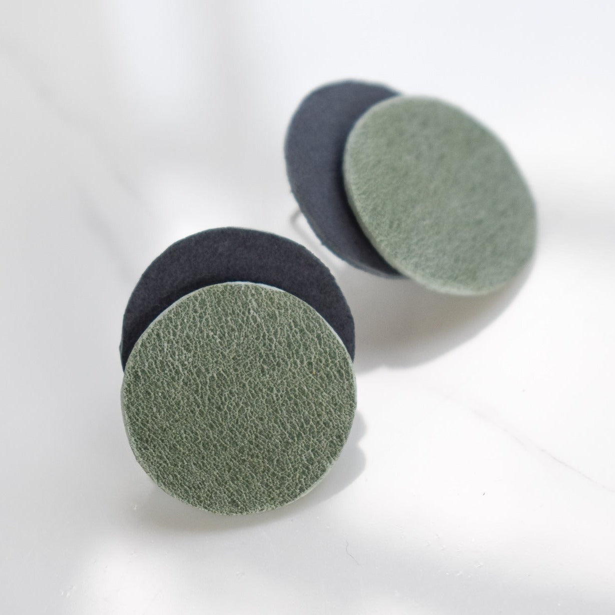 Handmade, light weight and comfortable to wear all day long leather earrings. All our earring hooks are made with a high quality stainless steel and they are hypo allergenic. They will not tarnish or irritate your sensitive skin.