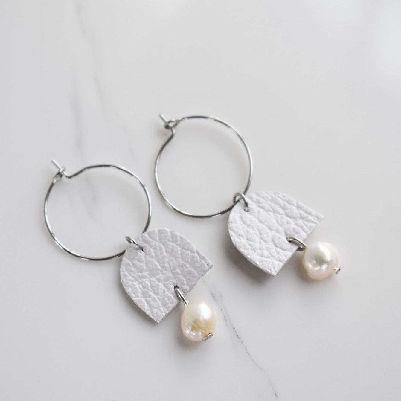 Handmade, light weight and comfortable to wear all day long leather earrings. All our earring hooks are made with a high quality stainless steel and they are hypo allergenic. They will not tarnish or irritate your sensitive skin.