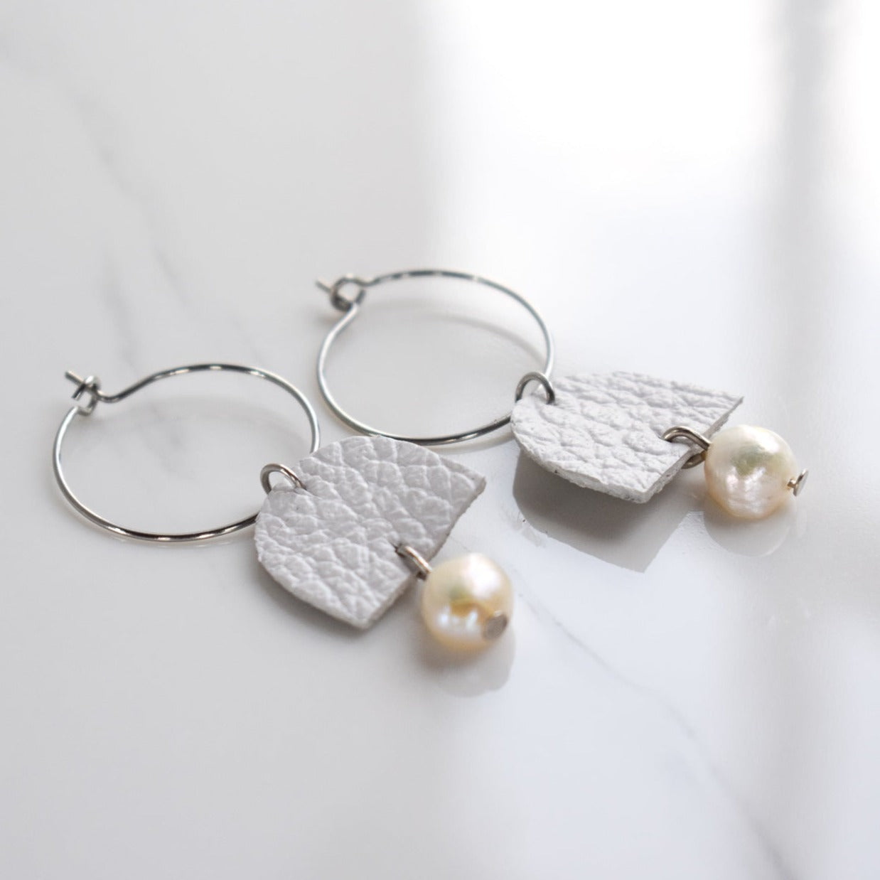 Handmade, light weight and comfortable to wear all day long leather earrings. All our earring hooks are made with a high quality stainless steel and they are hypo allergenic. They will not tarnish or irritate your sensitive skin.