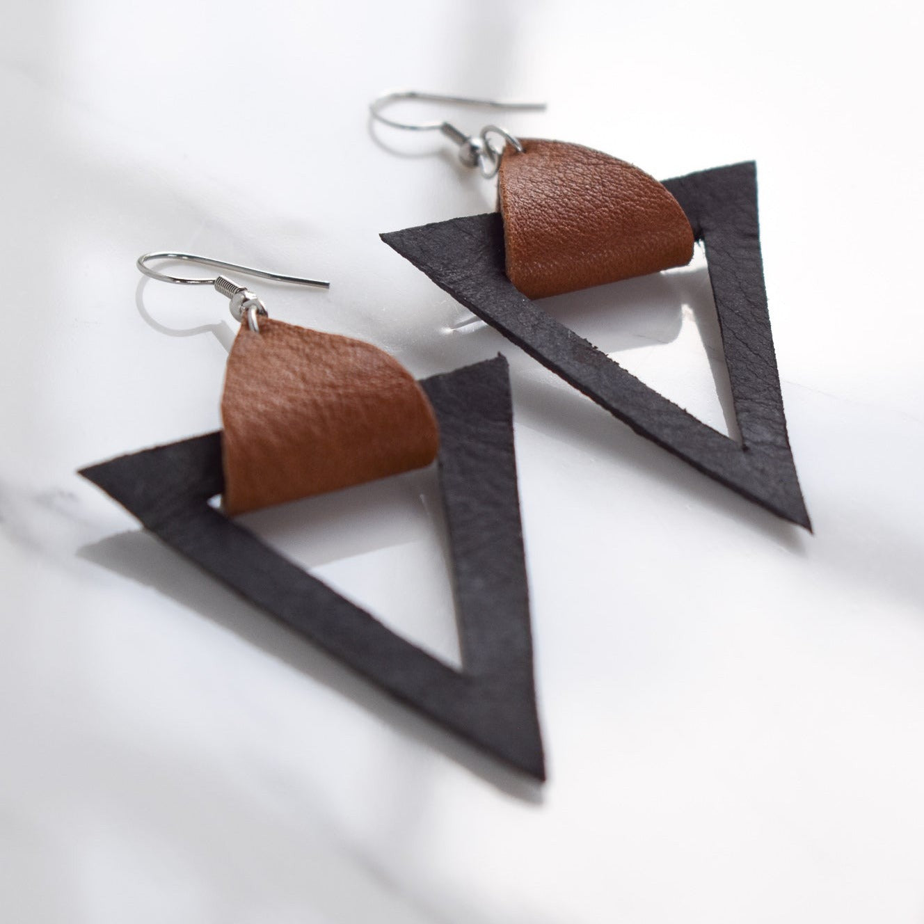 Handmade, light weight and comfortable to wear all day long leather earrings. All our earring hooks are made with a high quality stainless steel and they are hypo allergenic. They will not tarnish or irritate your sensitive skin.