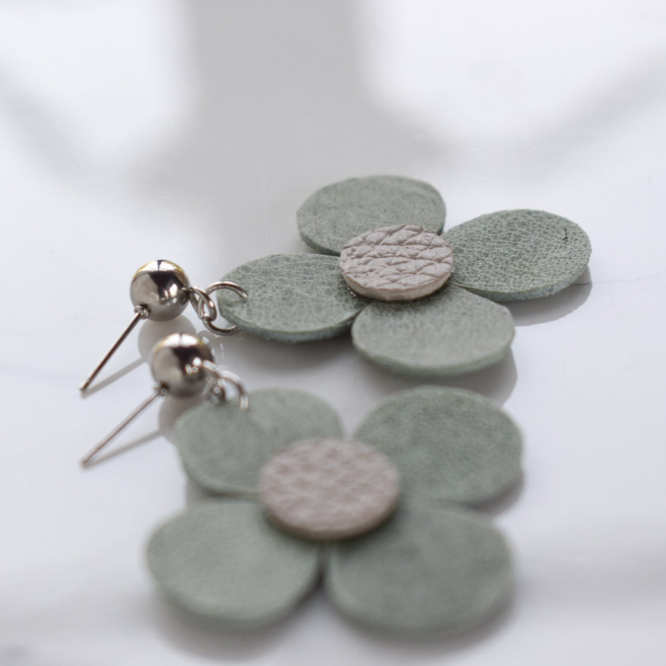 Handmade, light weight and comfortable to wear all day long leather earrings. All our earring hooks are made with a high quality stainless steel and they are hypo allergenic. They will not tarnish or irritate your sensitive skin.