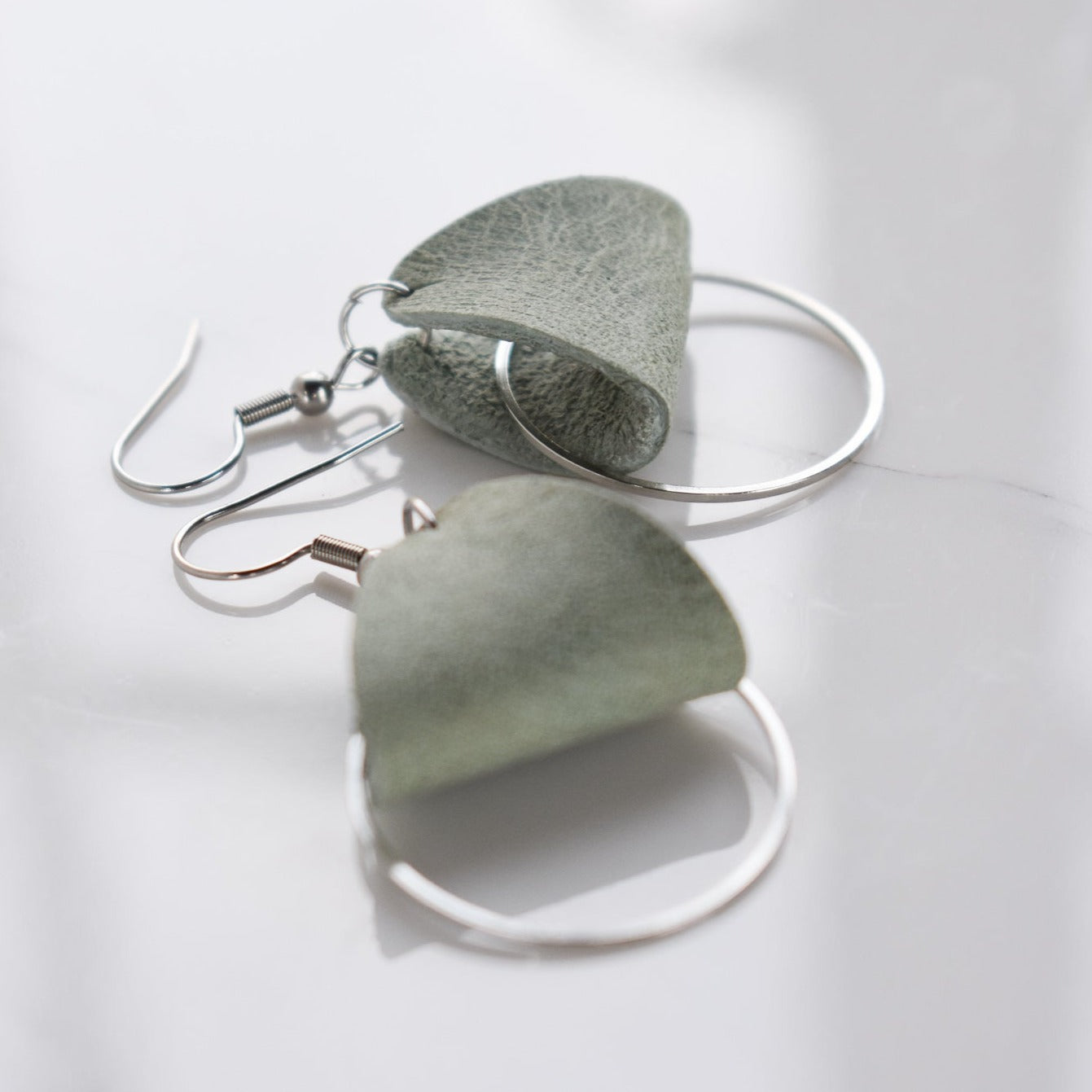Handmade, light weight and comfortable to wear all day long leather earrings. All our earring hooks are made with a high quality stainless steel and they are hypo allergenic. They will not tarnish or irritate your sensitive skin.