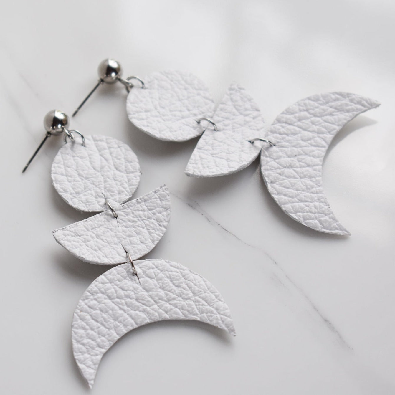 Handmade, light weight and comfortable to wear all day long leather earrings. All our earring hooks are made with a high quality stainless steel and they are hypo allergenic. They will not tarnish or irritate your sensitive skin.