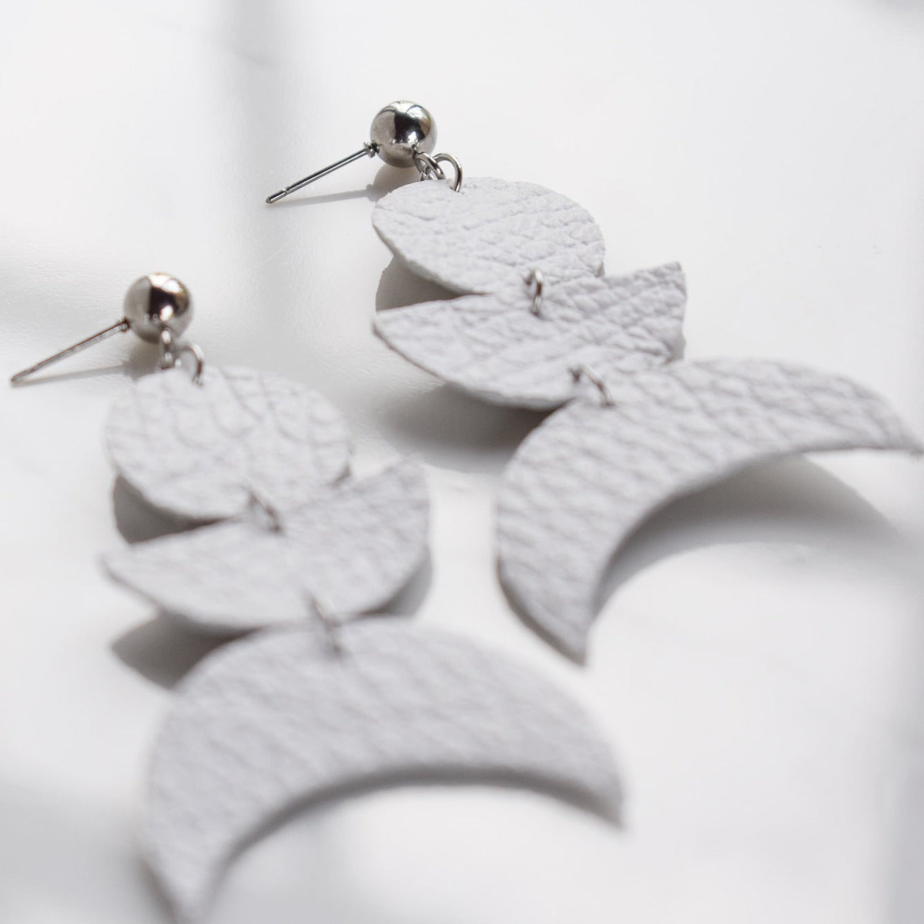 Handmade, light weight and comfortable to wear all day long leather earrings. All our earring hooks are made with a high quality stainless steel and they are hypo allergenic. They will not tarnish or irritate your sensitive skin.