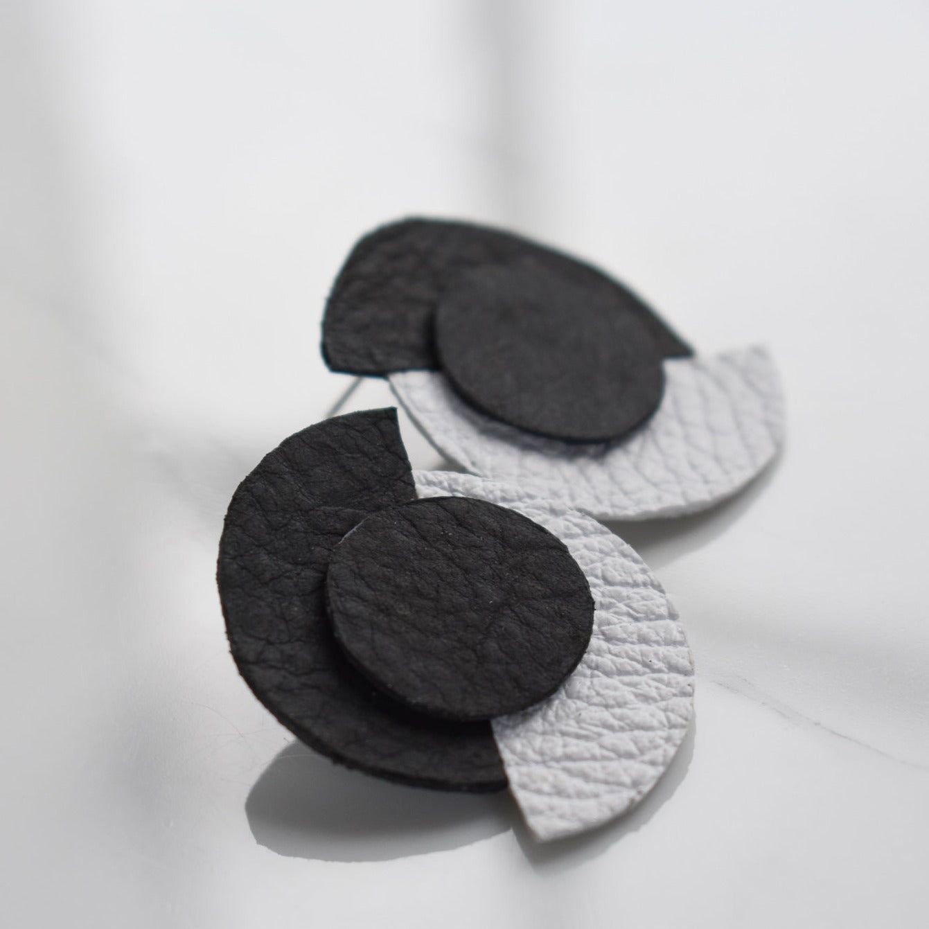 Handmade, light weight and comfortable to wear all day long leather earrings. All our earring hooks are made with a high quality stainless steel and they are hypo allergenic. They will not tarnish or irritate your sensitive skin.