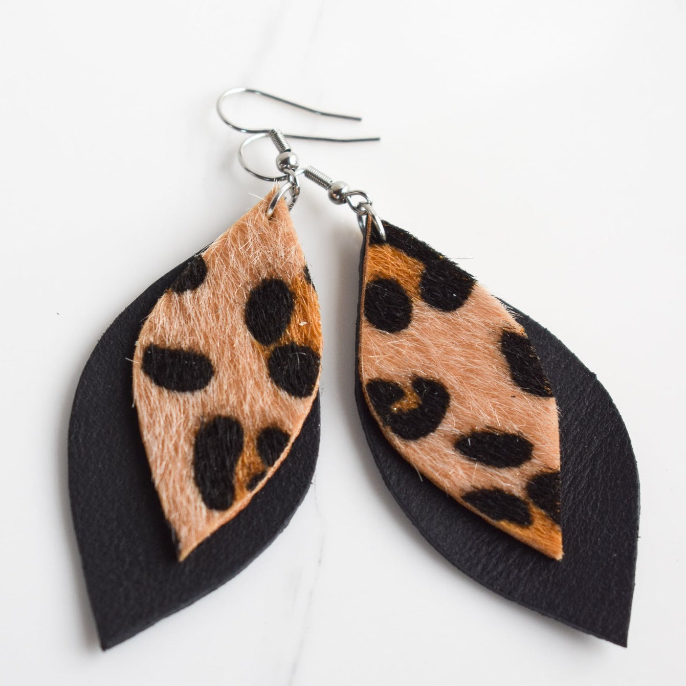 Handmade, light weight and comfortable to wear all day long leather earrings. All our earring hooks are made with a high quality stainless steel and they are hypo allergenic. They will not tarnish or irritate your sensitive skin.