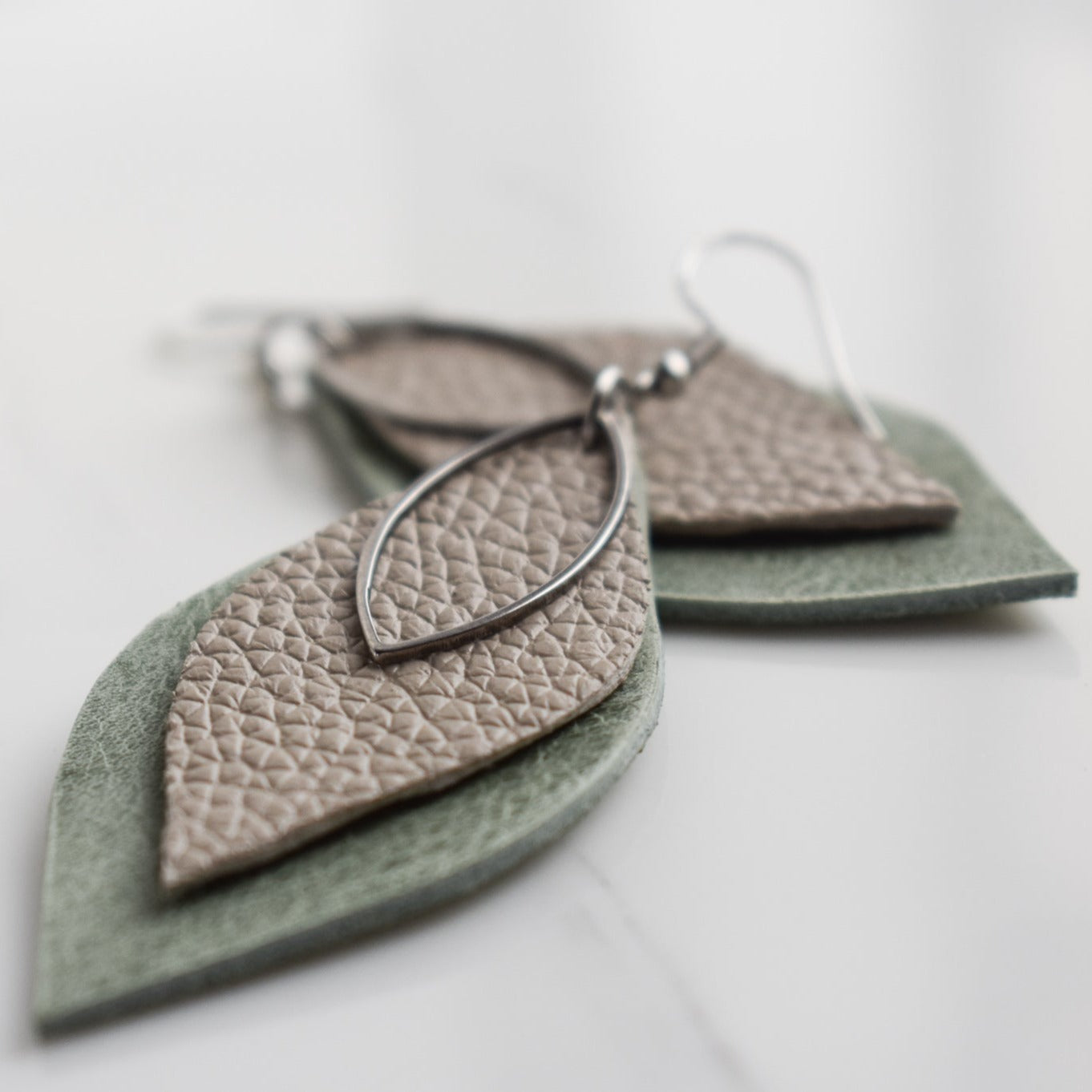 Handmade, light weight and comfortable to wear all day long leather earrings. All our earring hooks are made with a high quality stainless steel and they are hypo allergenic. They will not tarnish or irritate your sensitive skin.