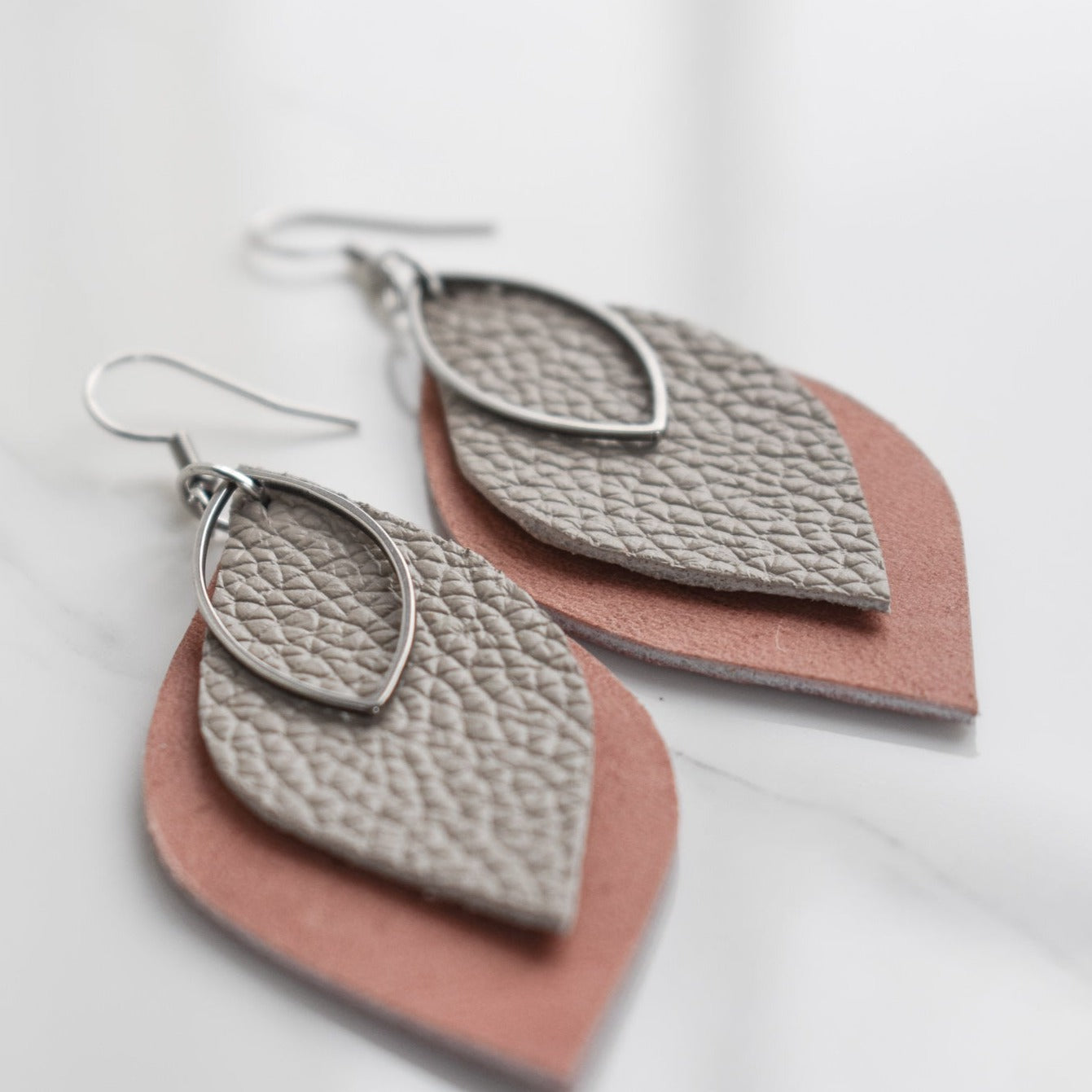 Handmade, light weight and comfortable to wear all day long leather earrings. All our earring hooks are made with a high quality stainless steel and they are hypo allergenic. They will not tarnish or irritate your sensitive skin.