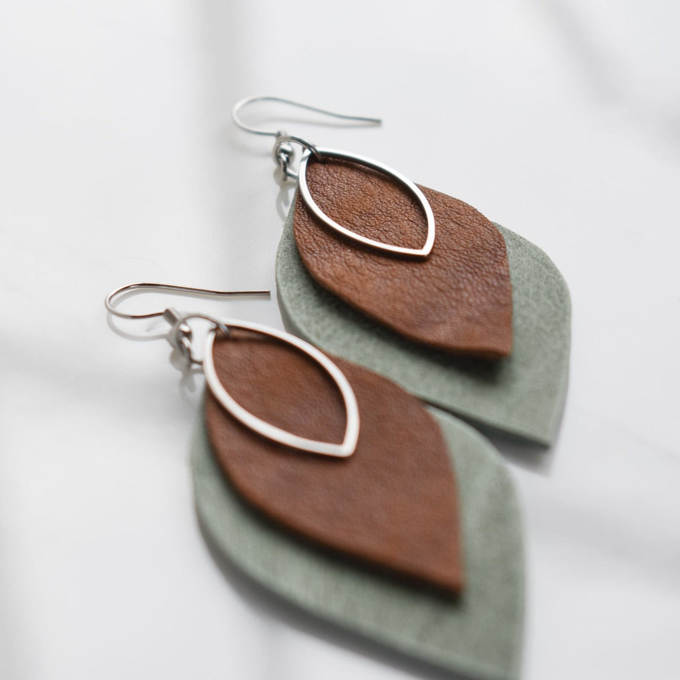 Handmade, light weight and comfortable to wear all day long leather earrings. All our earring hooks are made with a high quality stainless steel and they are hypo allergenic. They will not tarnish or irritate your sensitive skin.