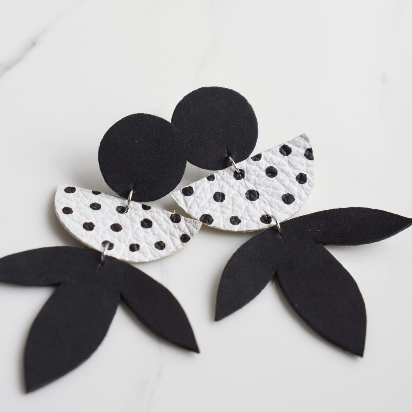 Handmade, light weight and comfortable to wear all day long leather earrings. All our earring hooks are made with a high quality stainless steel and they are hypo allergenic. They will not tarnish or irritate your sensitive skin.