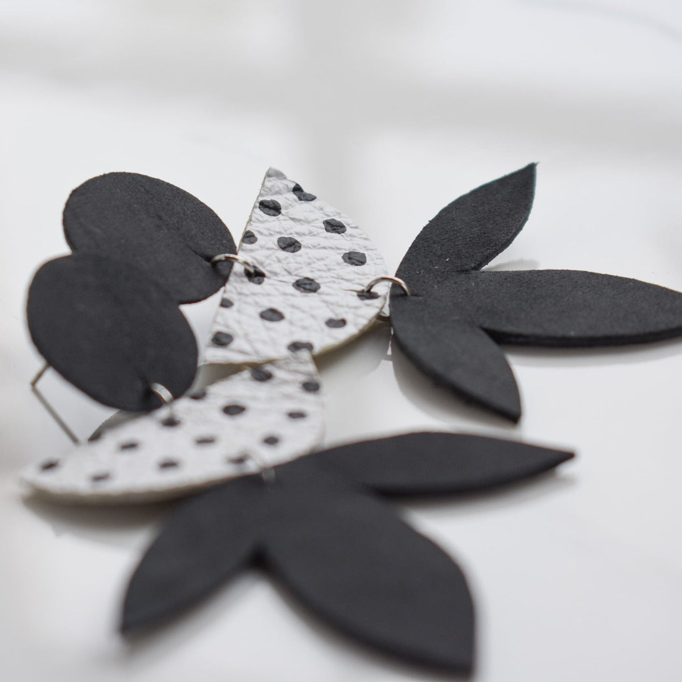Handmade, light weight and comfortable to wear all day long leather earrings. All our earring hooks are made with a high quality stainless steel and they are hypo allergenic. They will not tarnish or irritate your sensitive skin.