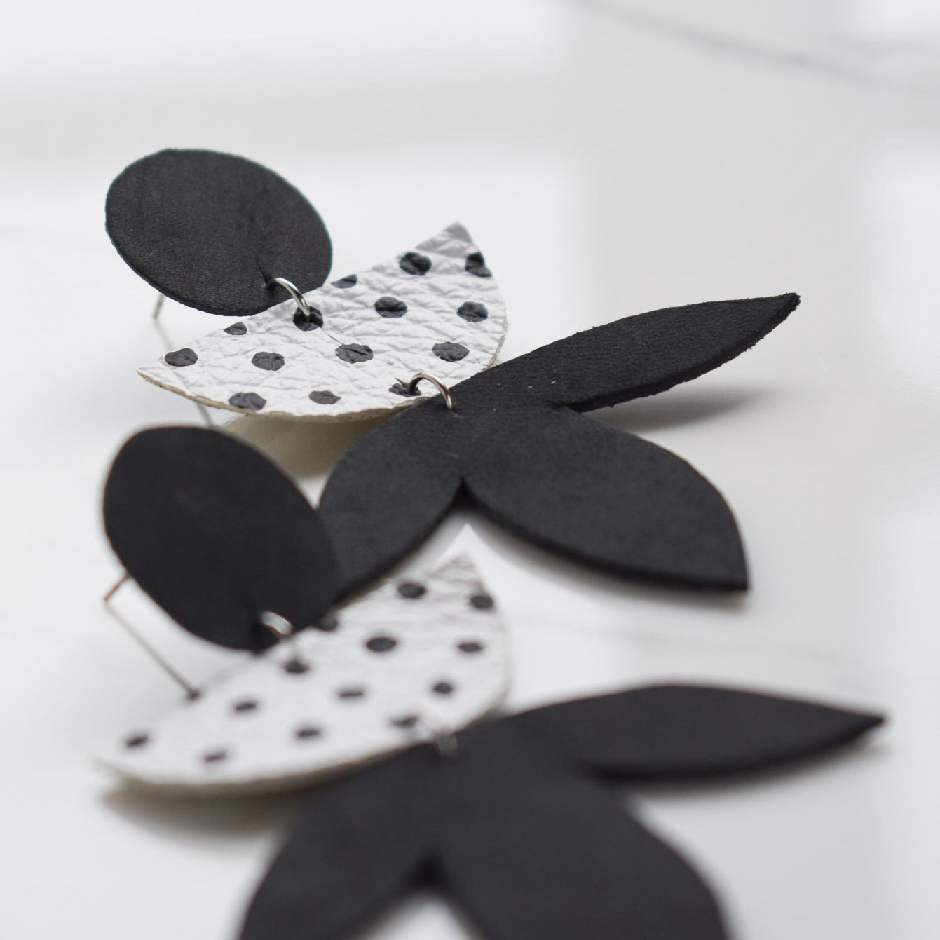 Handmade, light weight and comfortable to wear all day long leather earrings. All our earring hooks are made with a high quality stainless steel and they are hypo allergenic. They will not tarnish or irritate your sensitive skin.
