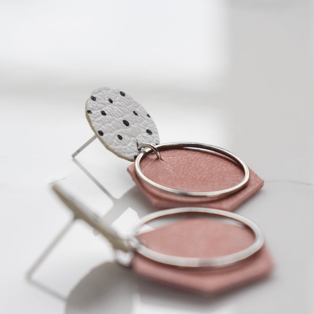 Handmade, light weight and comfortable to wear all day long leather earrings. All our earring hooks are made with a high quality stainless steel and they are hypo allergenic. They will not tarnish or irritate your sensitive skin.