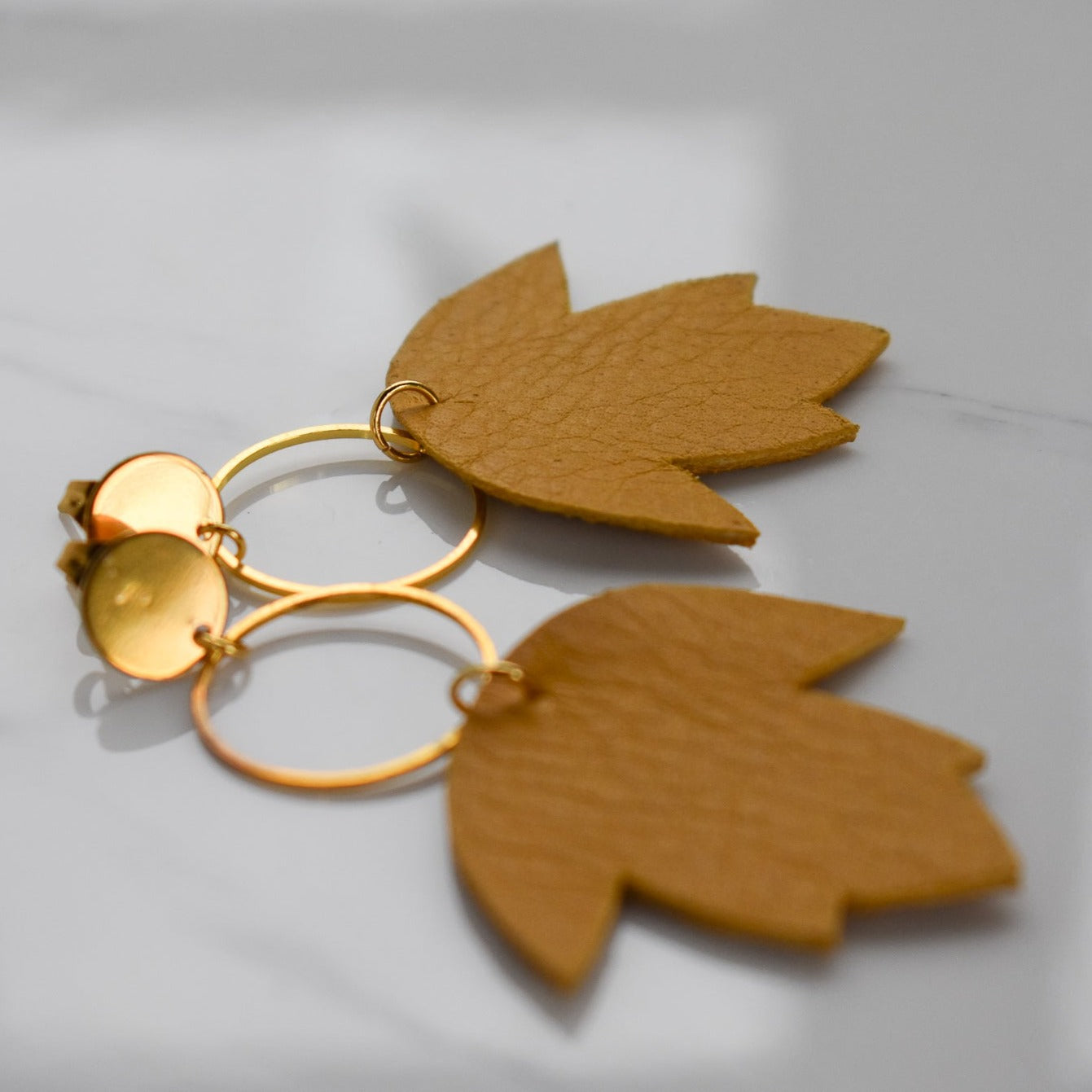 Handmade, light weight and comfortable to wear all day long leather earrings. All our earring hooks are made with a high quality stainless steel and they are hypo allergenic. They will not tarnish or irritate your sensitive skin.