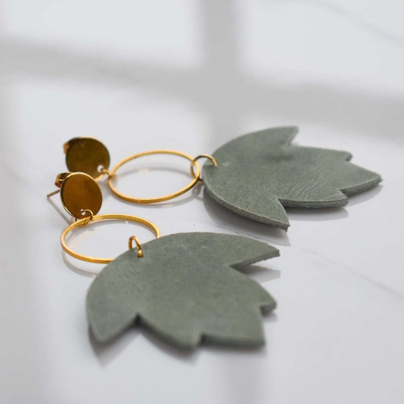 Handmade, light weight and comfortable to wear all day long leather earrings. All our earring hooks are made with a high quality stainless steel and they are hypo allergenic. They will not tarnish or irritate your sensitive skin.