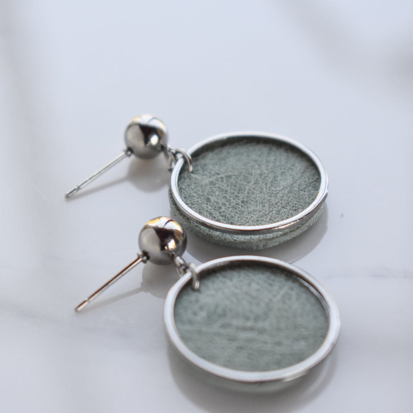 Handmade, light weight and comfortable to wear all day long leather earrings. All our earring hooks are made with a high quality stainless steel and they are hypo allergenic. They will not tarnish or irritate your sensitive skin.