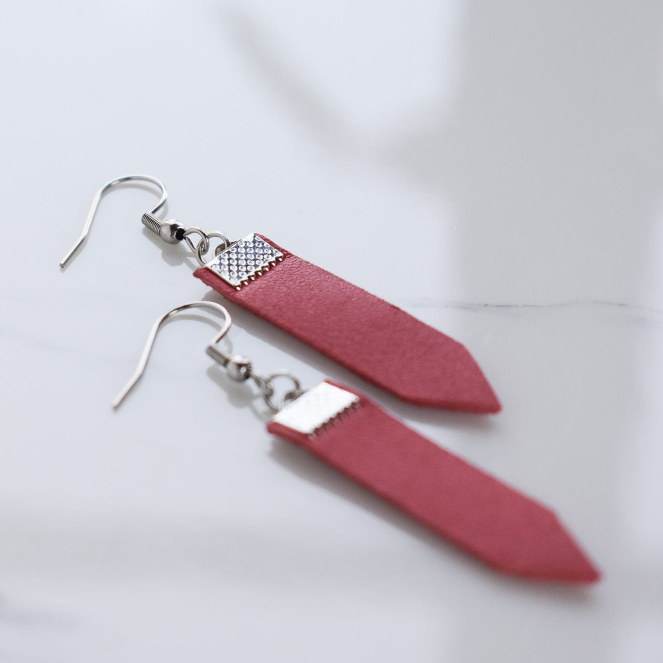 Handmade, light weight and comfortable to wear all day long leather earrings. All our earring hooks are made with a high quality stainless steel and they are hypo allergenic. They will not tarnish or irritate your sensitive skin.