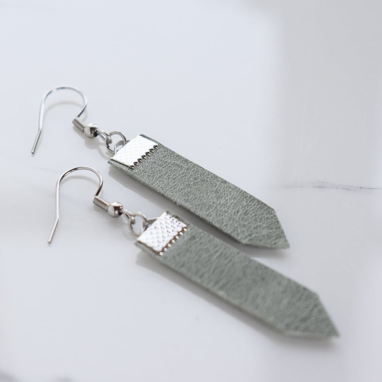 Handmade, light weight and comfortable to wear all day long leather earrings. All our earring hooks are made with a high quality stainless steel and they are hypo allergenic. They will not tarnish or irritate your sensitive skin.