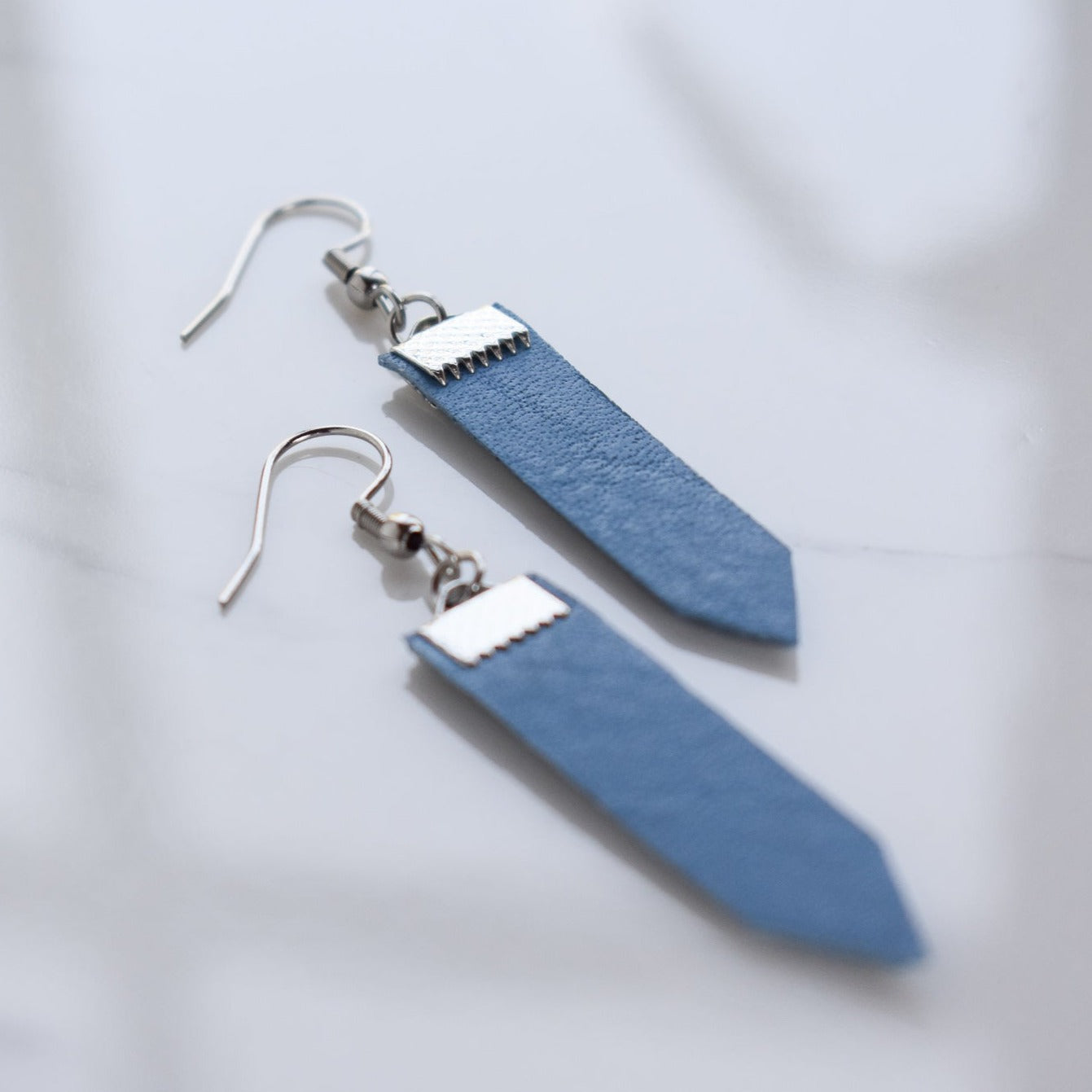 Handmade, light weight and comfortable to wear all day long leather earrings. All our earring hooks are made with a high quality stainless steel and they are hypo allergenic. They will not tarnish or irritate your sensitive skin.