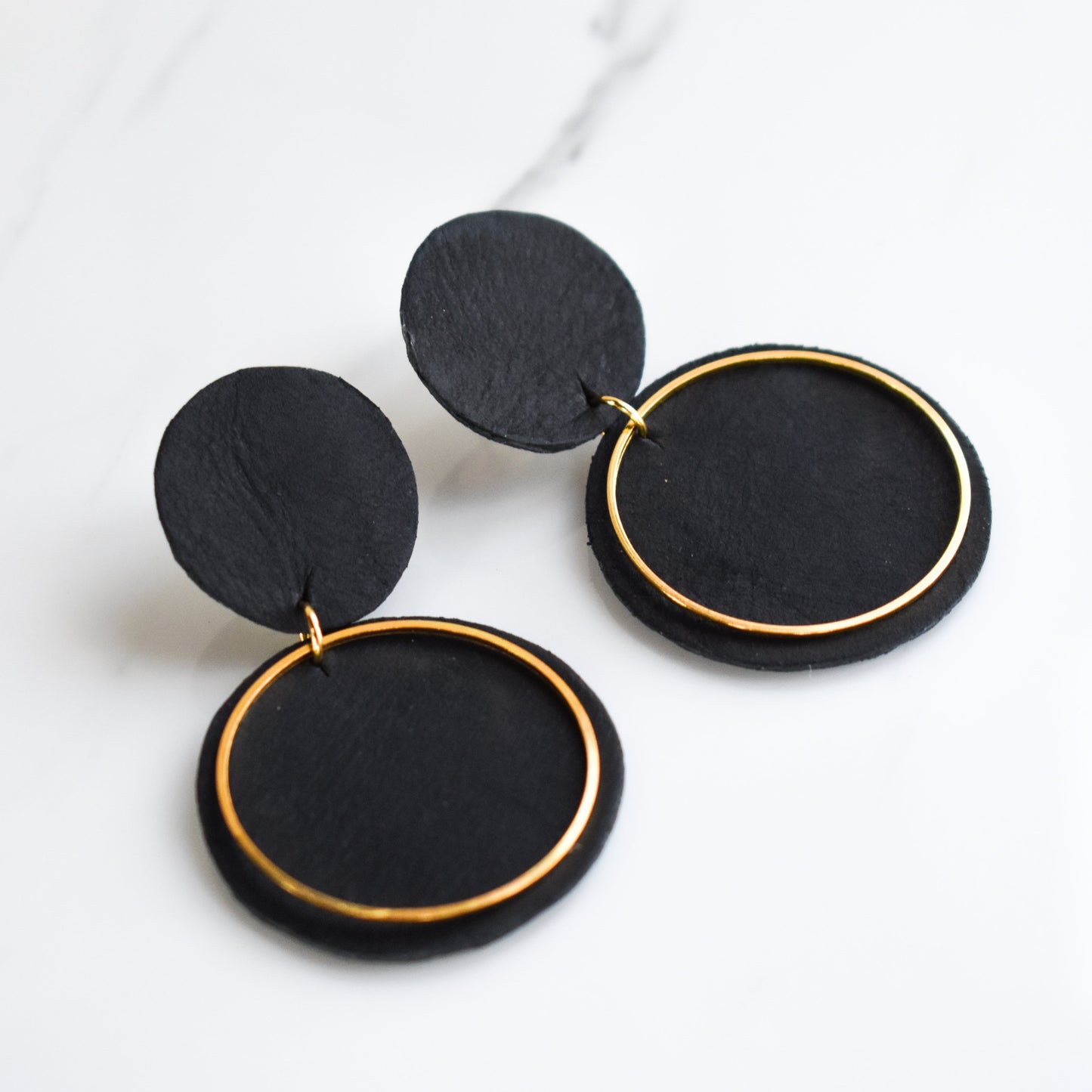 Handmade, light weight and comfortable to wear all day long leather earrings. All our earring hooks are made with a high quality stainless steel and they are hypo allergenic. They will not tarnish or irritate your sensitive skin.