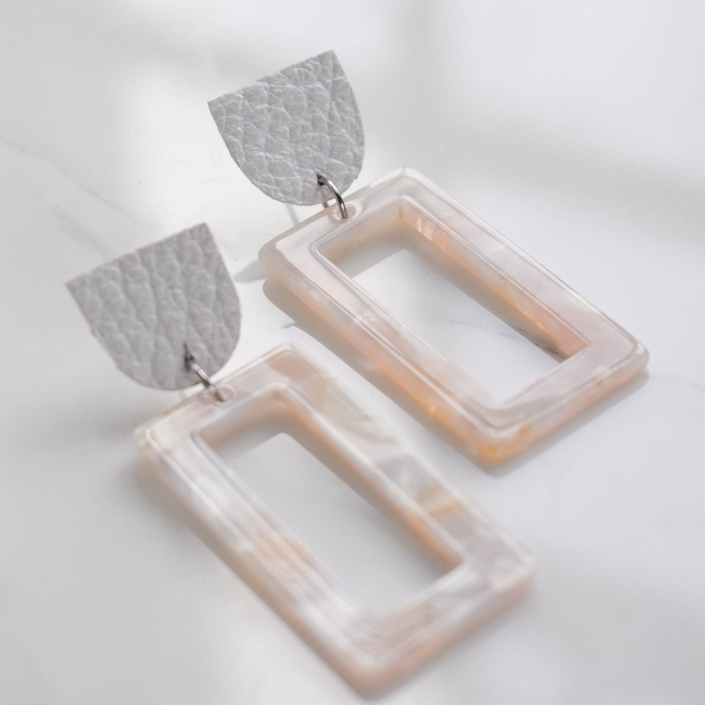 Handmade, light weight and comfortable to wear all day long leather earrings. All our earring hooks are made with a high quality stainless steel and they are hypo allergenic. They will not tarnish or irritate your sensitive skin.