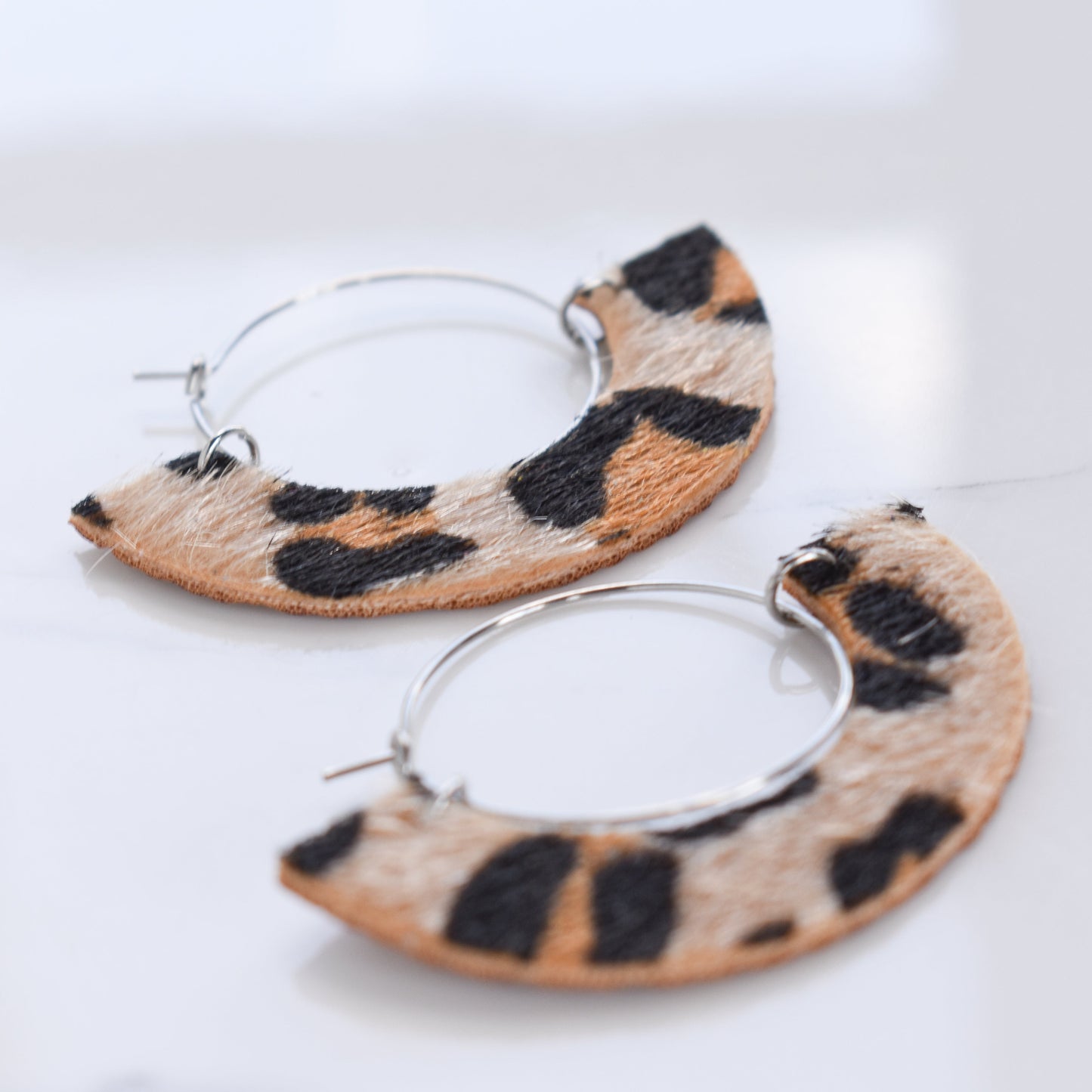 Handmade, light weight and comfortable to wear all day long leather earrings. All our earring hooks are made with a high quality stainless steel and they are hypo allergenic. They will not tarnish or irritate your sensitive skin.