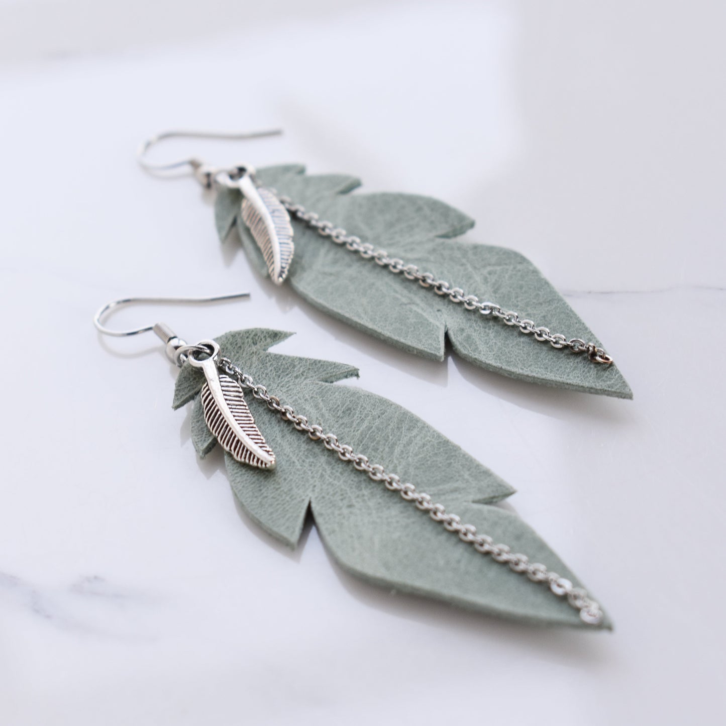 Handmade, light weight and comfortable to wear all day long leather earrings. All our earring hooks are made with a high quality stainless steel and they are hypo allergenic. They will not tarnish or irritate your sensitive skin.