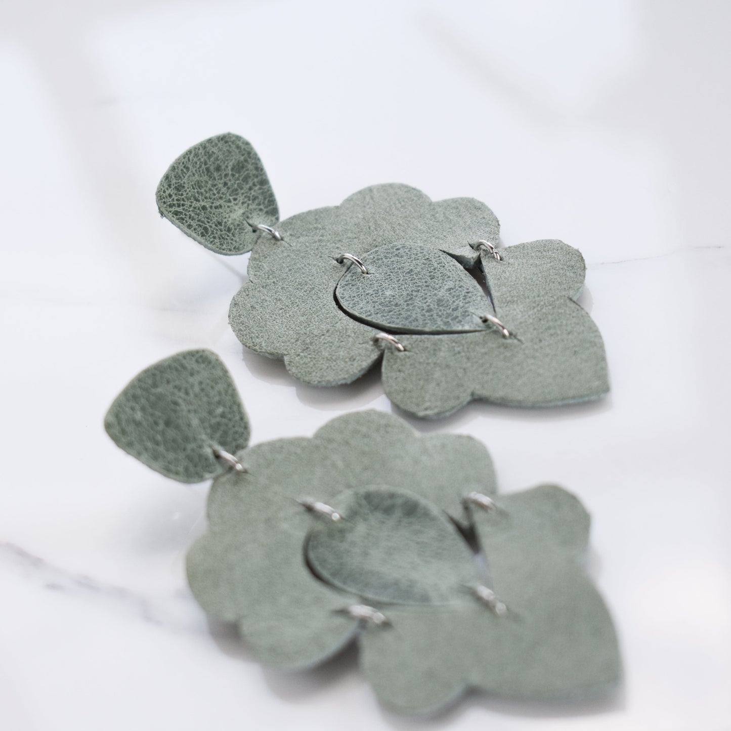 Handmade, light weight and comfortable to wear all day long leather earrings. All our earring hooks are made with a high quality stainless steel and they are hypo allergenic. They will not tarnish or irritate your sensitive skin.