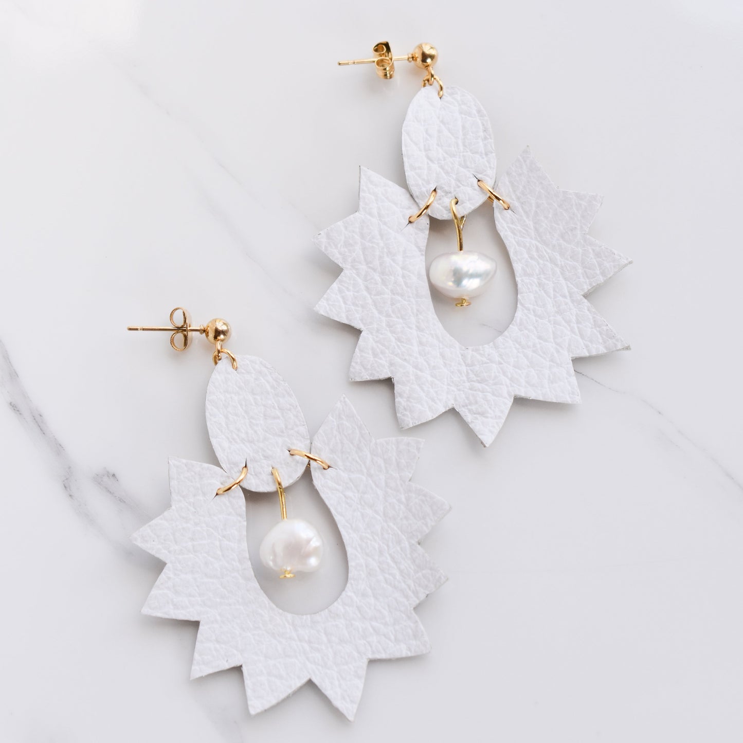 Handmade, light weight and comfortable to wear all day long leather earrings. All our earring hooks are made with a high quality stainless steel and they are hypo allergenic. They will not tarnish or irritate your sensitive skin.