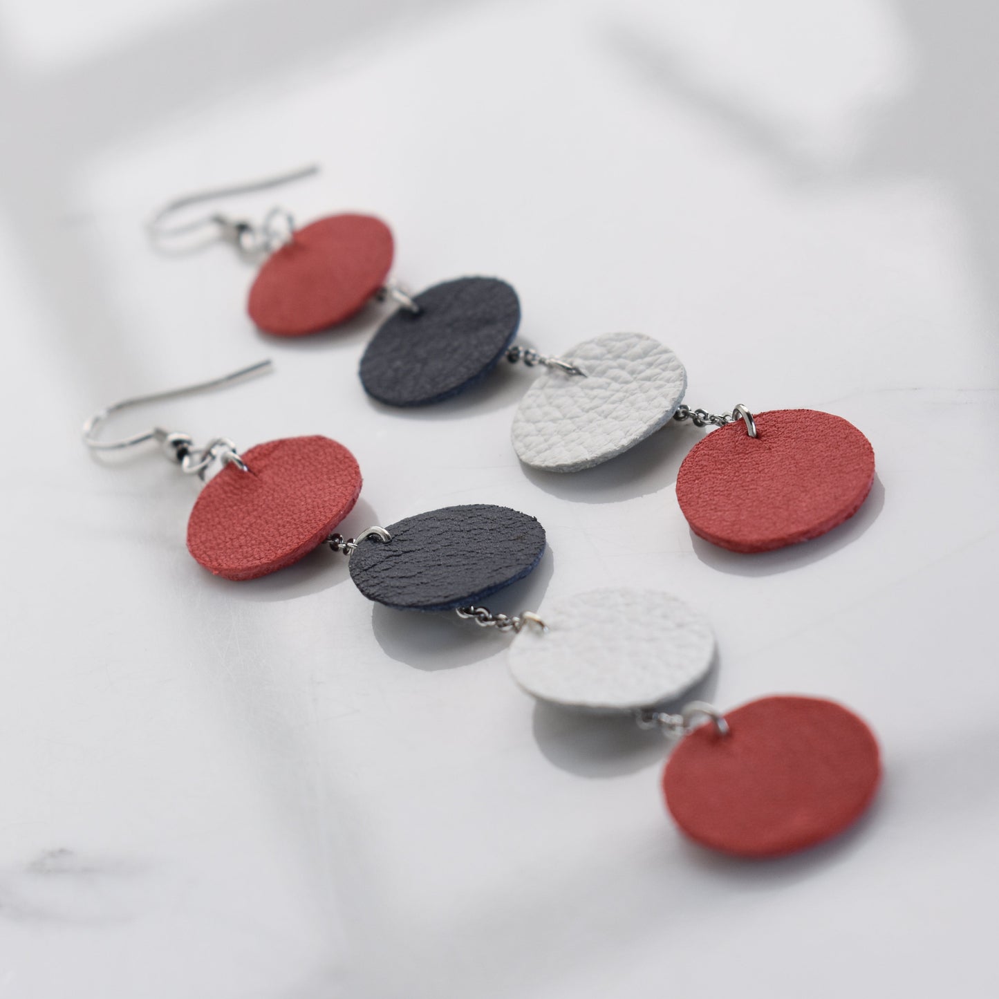 Handmade, light weight and comfortable to wear all day long leather earrings. All our earring hooks are made with a high quality stainless steel and they are hypo allergenic. They will not tarnish or irritate your sensitive skin.