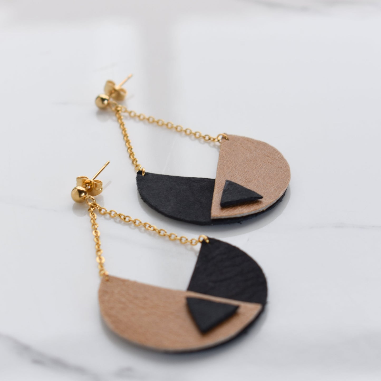 Handmade, light weight and comfortable to wear all day long leather earrings. All our earring hooks are made with a high quality stainless steel and they are hypo allergenic. They will not tarnish or irritate your sensitive skin.