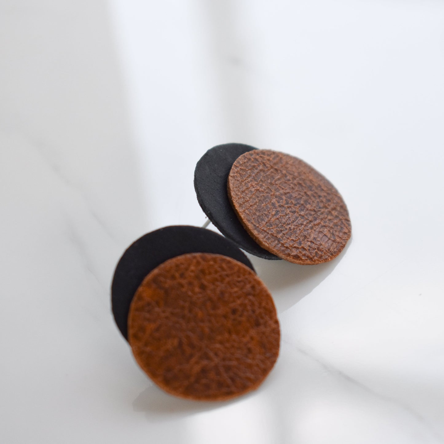 Handmade, light weight and comfortable to wear all day long leather earrings. All our earring hooks are made with a high quality stainless steel and they are hypo allergenic. They will not tarnish or irritate your sensitive skin.