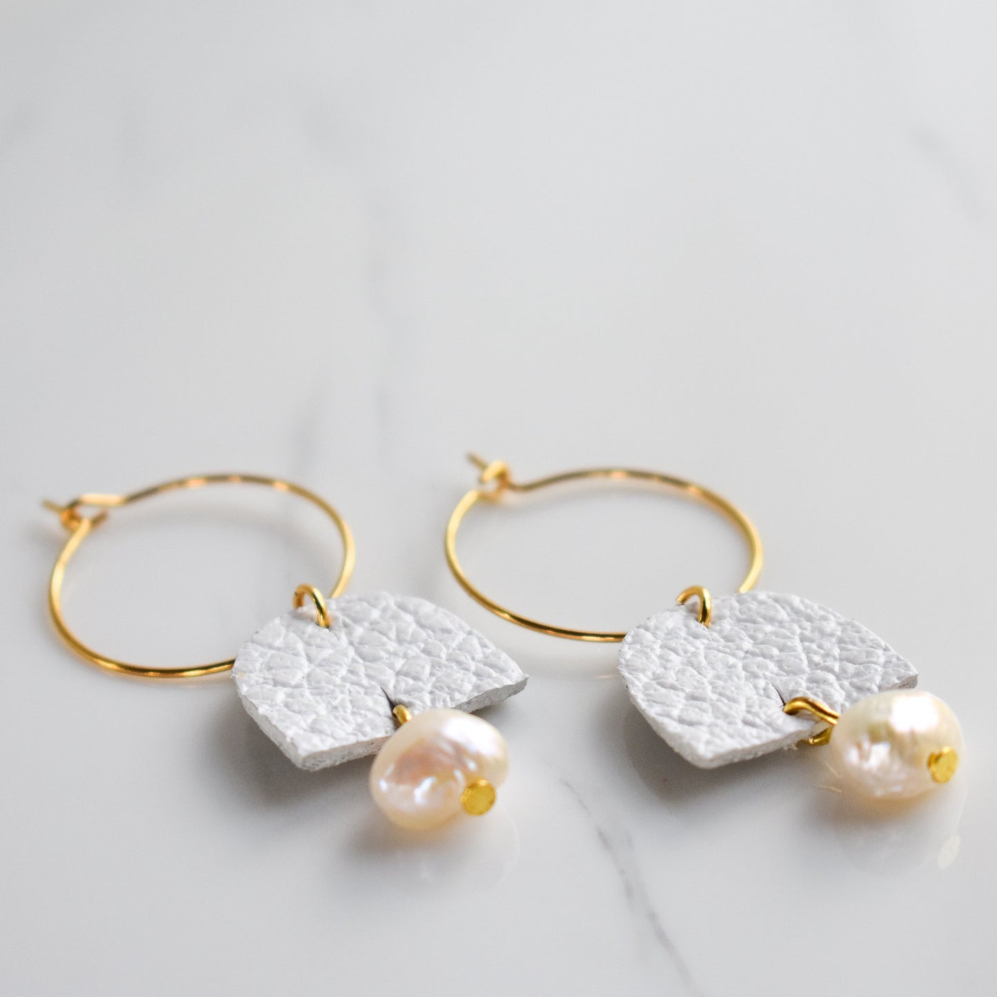 Handmade, light weight and comfortable to wear all day long leather earrings. All our earring hooks are made with a high quality stainless steel and they are hypo allergenic. They will not tarnish or irritate your sensitive skin.