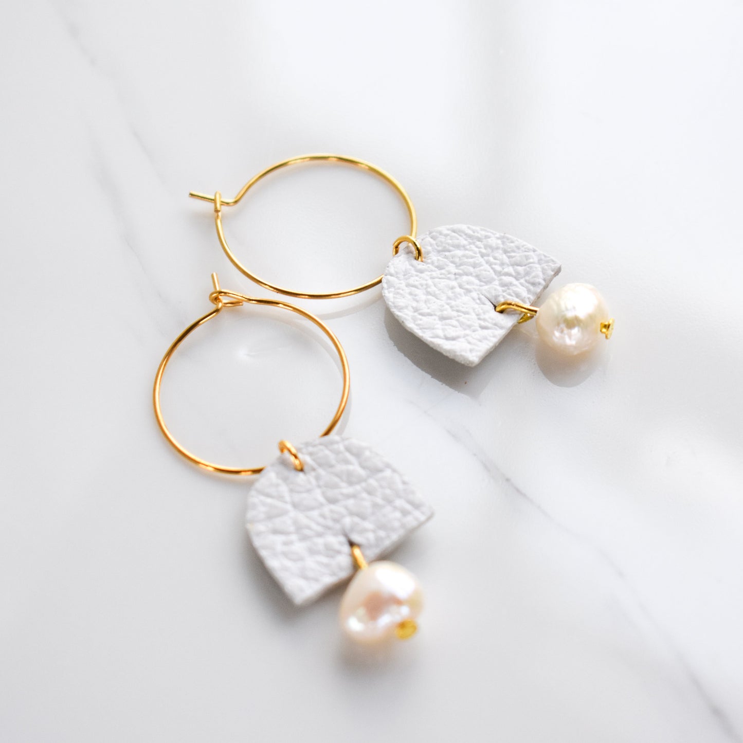 Handmade, light weight and comfortable to wear all day long leather earrings. All our earring hooks are made with a high quality stainless steel and they are hypo allergenic. They will not tarnish or irritate your sensitive skin.